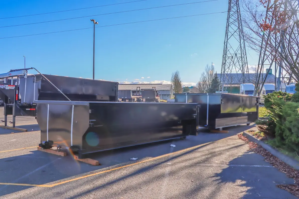 Roll-off dumpster ready for waste disposal at job site for Demolition Dumpster Rental in Auburn